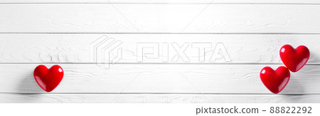 Two Red Heart shapes on wooden rustic background Two Red Heart shapes on wooden rustic background 88822292