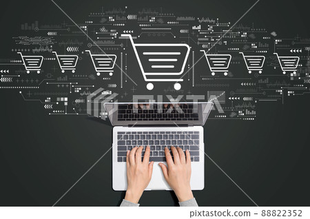 Online shopping theme with person using laptop Online shopping theme with person using laptop 88822352