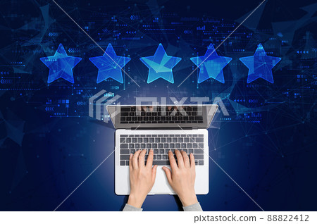 Rating star concept with person using laptop 88822412