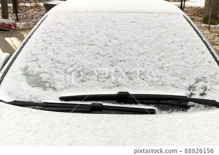 Close up of Graupel Snow pellets on a Windshield of a Vehicle Close up of Graupel Snow pellets on a Windshield of a Vehicle 88826156