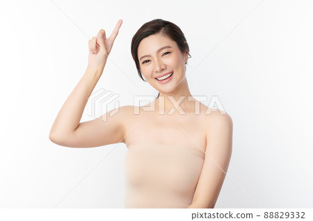 Beautiful young asian woman with clean fresh skin on white background, Face care, Facial treatment, 88829332