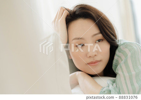 Young woman in poor health Young woman in poor health 88831076