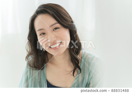 A woman enjoying a pleasant morning A woman enjoying a pleasant morning 88831488