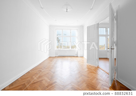 new flat, empty apartment room with wooden parquet floor 88832631