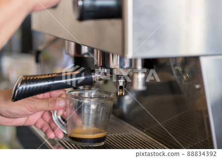 coffee machine making espresso in a cafe coffee machine making espresso in a cafe 88834392