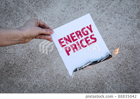Energy Prices concept. Burning sheet of paper with text Energy Prices concept. Burning sheet of paper with text 88835042
