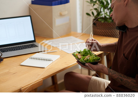 Man Eating Salad for Lunch 88836020