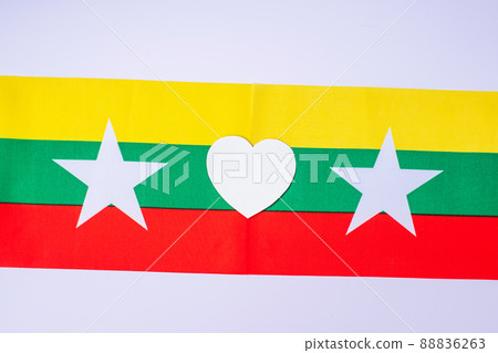 Support for Myanmar people, peace dove with flag of Myanmar. Freedom, stop war, dictatorship and democracy concepts 88836263