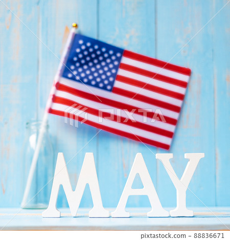 MAY text and United States of America flag on wooden table background. happy Memorial day and holiday celebration concepts MAY text and United States of America flag on wooden table background. happy Memorial day and holiday celebration concepts 88836671