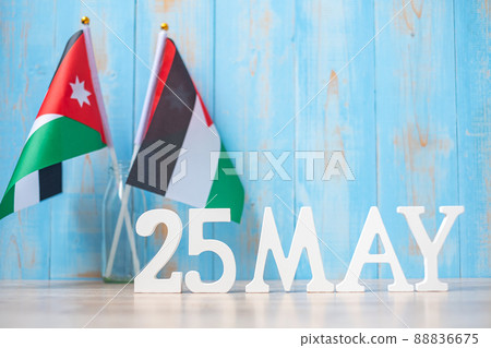 Wooden text of May 25th with Jordan flags. Jordan Independence day and happy celebration concepts Wooden text of May 25th with Jordan flags. Jordan Independence day and happy celebration concepts 88836675