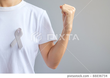 Brain Cancer Awareness month, grey color Ribbon for supporting people living. Healthcare and World cancer day concept Brain Cancer Awareness month, grey color Ribbon for supporting people living. Healthcare and World cancer day concept 88836734