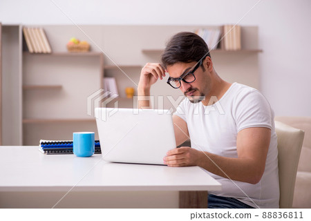 Young male freelancer working from home 88836811