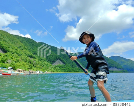 Boys enjoying SUP Lake Motosu Boys enjoying SUP Lake Motosu 88838441