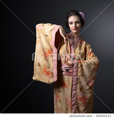 beautiful woman in traditional japanese kimono on black background 88840332