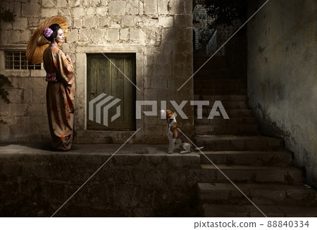 beautiful woman in kimono with umbrella and cute dog 88840334