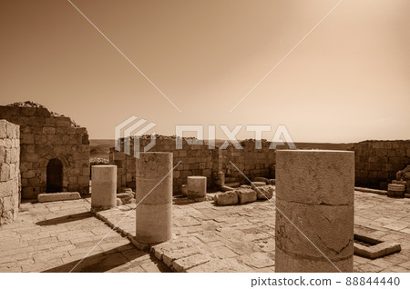 View of the ruined buildings in the ancient Nabataean city of Avdat, now a national Park, in the Negev Desert View of the ruined buildings in the ancient Nabataean city of Avdat, now a national Park, in the Negev Desert 88844440