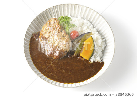 A bird's-eye view of a hot hamburger curry with stewed vegetables and parsley on a white background 88846366