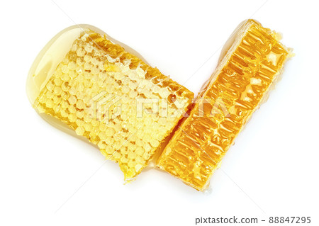 Honeycomb isolated on white background. Honey comb close up top view. Honeycomb isolated on white background. Honey comb close up top view. 88847295