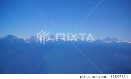 Himalayan mountains and Everest seen from a scenic flight [Nepal] 88847854