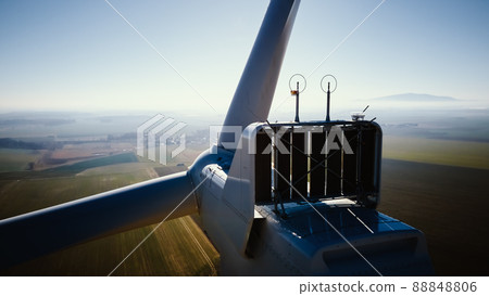 Aerial view of close up windmill turbine in countryside area, Wind power and renewable sustainable energy concept Aerial view of close up windmill turbine in countryside area, Wind power and renewable sustainable energy concept 88848806