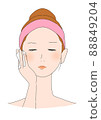 Woman applying lotion with cotton 88849204