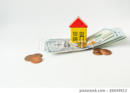 International currency money including euro, dollar, coin, dollar bill. The inscription in wooden letters money investments. The concept of mortgages, investments, loans, debts. 88849913