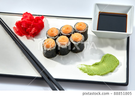 Sushi rolls and chopsticks on white background, space for text. Japanese food 88851805