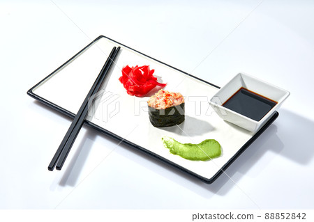Japanese Cuisine - Sushi Roll syake maki on a white background. 88852842