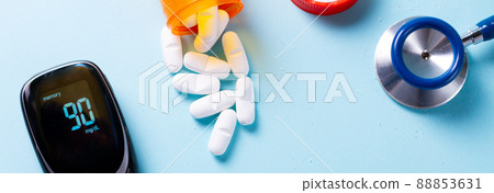 White pills on blue background White pills on blue background 88853631