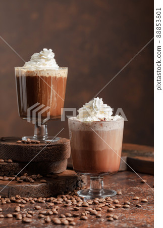 Coffee and chocolate drinks with whipped cream. Coffee and chocolate drinks with whipped cream. 88853801
