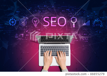 SEO concept with person using laptop 88855279