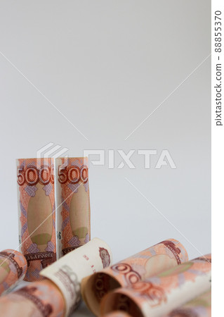Russian banknotes in a roll isolated on a white background. 88855370
