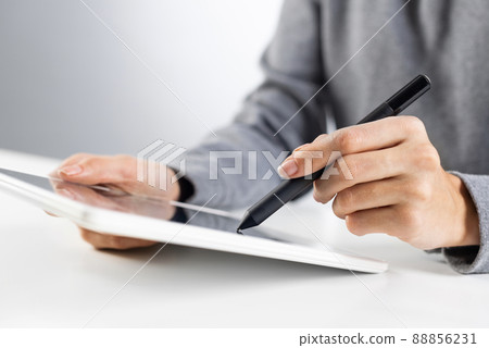 Businesswoman using tablet computer for news read Businesswoman using tablet computer for news read 88856231