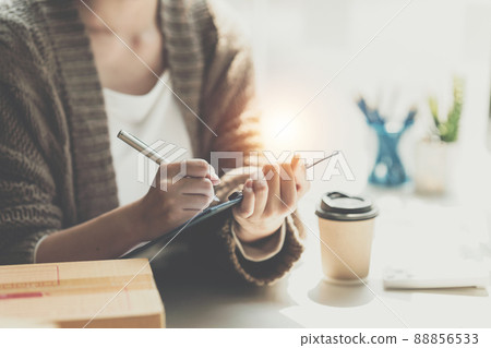 Asian small business owner working at home office. Business retail market and online sell marketing delivery, SME e-commerce concept. 88856533