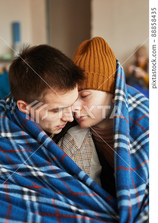 Hopeful Young Couple in Shelter Hopeful Young Couple in Shelter 88858435