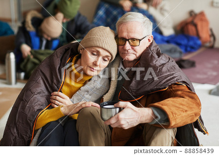 Mature Couple in Refugee Shelter 88858439