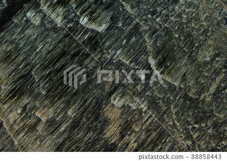 The mineral galena. Close-up, background and texture of the mineral The mineral galena. Close-up, background and texture of the mineral 88858443