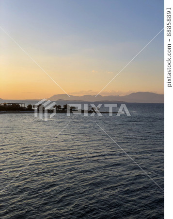 Beautiful sunset at the seaside, Greece Beautiful sunset at the seaside, Greece 88858891