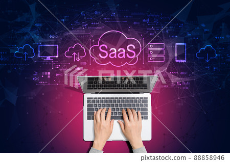 SaaS - software as a service concept with person using laptop 88858946