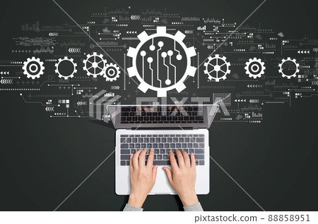 Automation concept with person using laptop Automation concept with person using laptop 88858951