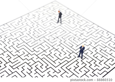Businessman lost in a square maze Businessman lost in a square maze 88860310