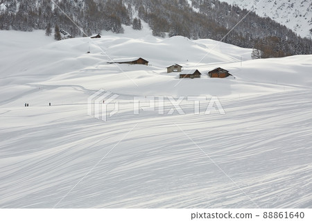 Skiing slopeswith some cross country tracks 88861640