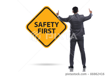 Safety first concept with businessman Safety first concept with businessman 88862416
