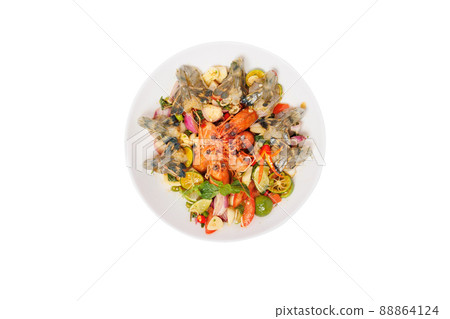 Raw shrimp with Thai sauce is a very delicious dish and a famous street food in Thailand Raw shrimp with Thai sauce is a very delicious dish and a famous street food in Thailand 88864124