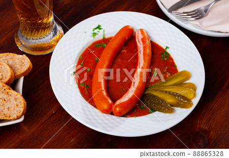 Wiener sausages with goulash sauce 88865328