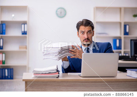 Young male employee working in the office 88866145