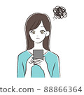 Woman holding a smartphone 88866364