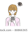 Woman holding a smartphone 88866365