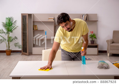 Young man doing housework at home 88867928