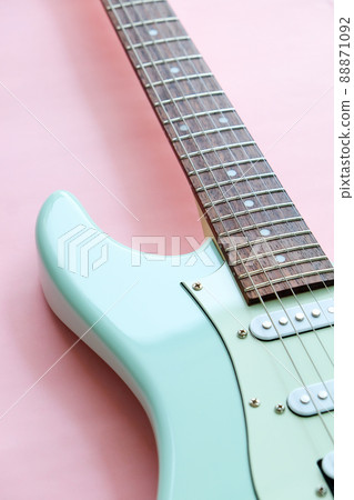 Mint Green Electric Guitar on a Pink  88871092